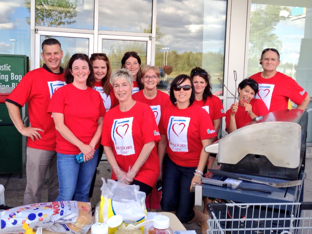 Saint John REALTORS® at their annual summer BBQ in support of local food banks.