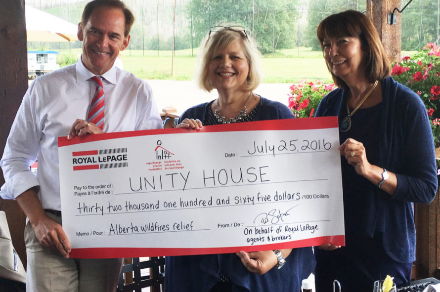 Royal LePage president presents cheque to Unity House