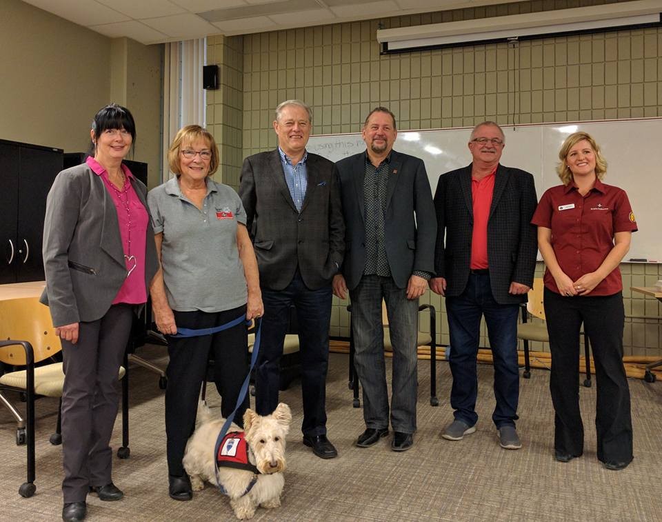 Left to right: REALTOR® Wanda Smith, REALTOR® and St. John Ambulance volunteer Margie Lynch, Association of Regina REALTORS® CEO Gord Archibald, REALTOR® Lane Bogehean, REALTOR® Ian Johnston and St. John Ambulance Director of Community Services Ashley Balysky. They are all joined by Taffy the Scottish Terrier. (Submitted photo)